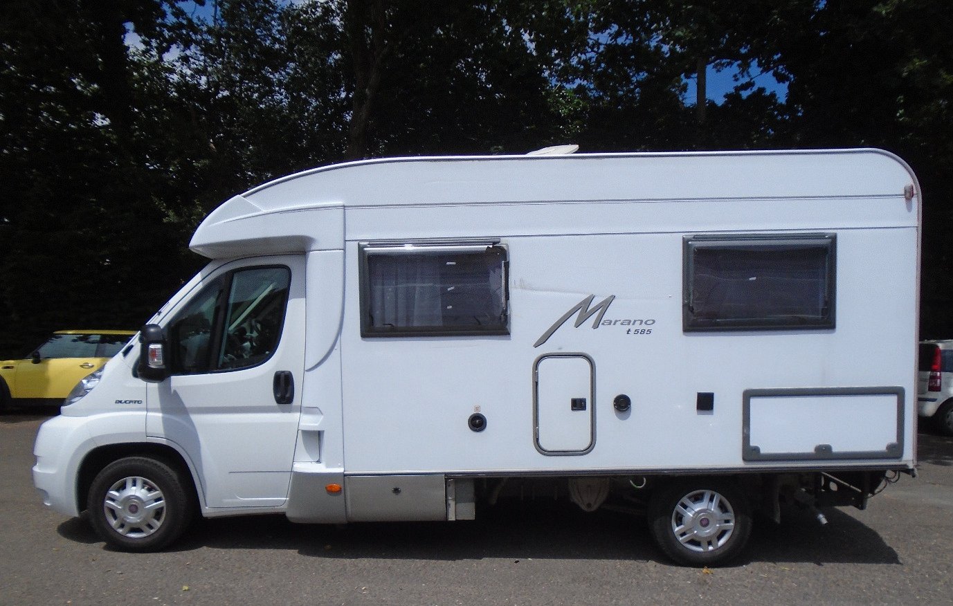 Motorhome side panel before repair